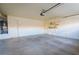 Garage with a water heater, ample space for storage, and access to the house at 1309 Misty View Ct, North Las Vegas, NV 89031