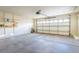 Garage with door, built-in shelving, and space for storage at 1309 Misty View Ct, North Las Vegas, NV 89031