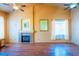 Bright living room features a fireplace, high ceilings and hardwood floors at 1309 Misty View Ct, North Las Vegas, NV 89031