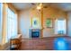 Bright living room features a fireplace, high ceilings and hardwood floors at 1309 Misty View Ct, North Las Vegas, NV 89031