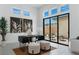 Bright office with modern decor, featuring clerestory windows and access to a charming outdoor seating area at 144 Tre Pietre St, Henderson, NV 89011