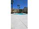 Enjoy the beautiful community pool area with palm trees at 1832 N Decatur Blvd # 104, Las Vegas, NV 89108