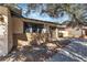 Charming single-story home featuring a secure gated entry, brick accents, and rock landscaping at 2204 Monterey Ave, Las Vegas, NV 89104