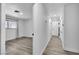 Hallway with hardwood floors leading to a bedroom at 2204 Monterey Ave, Las Vegas, NV 89104