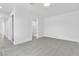 A bright bedroom features modern floors and neutral paint, providing a serene and inviting atmosphere at 244 N 19Th St, Las Vegas, NV 89101