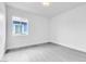 A bright bedroom features modern floors and natural light from the window, providing a serene atmosphere at 244 N 19Th St, Las Vegas, NV 89101