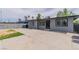 The charming home features a well-maintained exterior, a long driveway and a welcoming entrance at 244 N 19Th St, Las Vegas, NV 89101