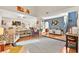 Bright living room with vaulted ceilings, hardwood floors, and stylish decor at 262 Cielito Lindo St, Henderson, NV 89012