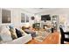 Cozy living room with fireplace, hardwood floors, and comfortable seating at 262 Cielito Lindo St, Henderson, NV 89012