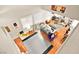 Bright, open-concept living room with hardwood floors, modern decor, and cozy fireplace at 262 Cielito Lindo St, Henderson, NV 89012