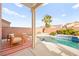 Relaxing backyard featuring a sparkling pool, patio area, and comfortable seating at 262 Cielito Lindo St, Henderson, NV 89012