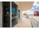 Spacious balcony with glass railings and stunning city views and a dining area reflected in the glass at 2747 Paradise Rd # 2606, Las Vegas, NV 89109