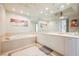 Bright bathroom featuring a soaking tub, dual sinks, and ample counter space at 2747 Paradise Rd # 2606, Las Vegas, NV 89109