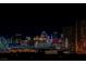 Night view of Las Vegas skyline featuring colorful building lights and the High Roller observation wheel at 2747 Paradise Rd # 2606, Las Vegas, NV 89109