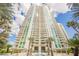 Stunning high-rise featuring a pool, lush landscaping, and inviting common areas at 2747 Paradise Rd # 2606, Las Vegas, NV 89109