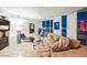 Inviting living room with a comfortable sofa, media center, and vibrant city views at 2747 Paradise Rd # 2606, Las Vegas, NV 89109