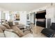 Comfortable living room featuring a plush sofa, media center, and city views at 2747 Paradise Rd # 2606, Las Vegas, NV 89109