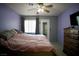 Well-appointed bedroom with ceiling fan and comfortable bedding at 2905 Gentilly Ln, Las Vegas, NV 89108