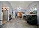Open floor plan featuring a large living room with vaulted ceilings and neutral-toned walls at 2905 Gentilly Ln, Las Vegas, NV 89108