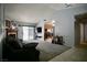 Spacious living room featuring comfortable seating, a fireplace, and access to the backyard at 2905 Gentilly Ln, Las Vegas, NV 89108