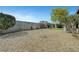 The spacious backyard features low-maintenance landscaping and a privacy wall at 291 Lido Dr, Henderson, NV 89015