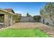 Expansive backyard with low-maintenance gravel landscaping and a covered patio for outdoor enjoyment at 291 Lido Dr, Henderson, NV 89015