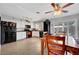 Spacious kitchen includes modern appliances, white cabinetry, and an adjacent dining area at 291 Lido Dr, Henderson, NV 89015