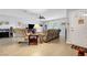 Cozy living room with tile floors, neutral walls, a ceiling fan, and a front door at 291 Lido Dr, Henderson, NV 89015
