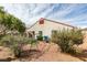 The backyard has a playground and low-maintenance landscaping for easy upkeep at 3561 Cherbourg Ave, Las Vegas, NV 89141