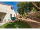 Spacious backyard featuring low-maintenance landscaping, mature tree, and plenty of room to enjoy outdoor living at 3561 Cherbourg Ave, Las Vegas, NV 89141