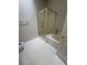 Bright bathroom features a glass enclosed shower and an adjacent soaking tub at 3561 Cherbourg Ave, Las Vegas, NV 89141