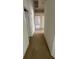 Carpeted hallway with multiple doorways at 3561 Cherbourg Ave, Las Vegas, NV 89141