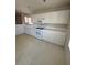 White kitchen with modern appliances and lots of counter space at 3561 Cherbourg Ave, Las Vegas, NV 89141