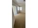 Bright living room with natural light and a sliding glass door at 3561 Cherbourg Ave, Las Vegas, NV 89141