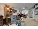 Comfortable living room with a ceiling fan and open floor plan at 3561 Cherbourg Ave, Las Vegas, NV 89141