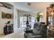 Living room with sliding door and workout space at 3561 Cherbourg Ave, Las Vegas, NV 89141