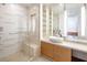 Stylish bathroom with a glass-enclosed shower, a built-in seat, and modern vanity with vessel sink at 3726 Las Vegas Blvd # 2504, Las Vegas, NV 89158
