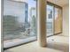 Bright room with a stunning city view through large windows, highlighting the building's urban setting at 3726 Las Vegas Blvd # 2504, Las Vegas, NV 89158