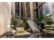Stunning lobby with high ceilings, modern staircase, and stylish seating area with ample natural light at 3726 Las Vegas Blvd # 2504, Las Vegas, NV 89158