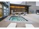 Chic outdoor kitchen and hot tub with modern bar seating, lounge chairs, and a relaxing atmosphere at 3726 Las Vegas Blvd # 2504, Las Vegas, NV 89158