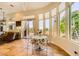 Sunny dining area with views of the backyard, and outdoor living. Modern design with elegant touches at 4 Dry Brook Trl, Henderson, NV 89052