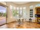 Sunny dining area with views of the backyard, and outdoor living. Modern design with elegant touches at 4 Dry Brook Trl, Henderson, NV 89052