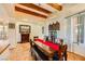 Bright dining area featuring wooden beams and stylish chandeliers, with natural light at 4 Dry Brook Trl, Henderson, NV 89052