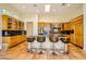 Modern kitchen featuring an island with seating and stainless steel appliances at 4 Dry Brook Trl, Henderson, NV 89052