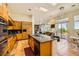 Bright kitchen boasts granite countertops, stainless appliances, and a large island with seating at 4 Dry Brook Trl, Henderson, NV 89052