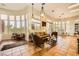 Spacious living room filled with natural light, neutral colors, and views of the backyard at 4 Dry Brook Trl, Henderson, NV 89052