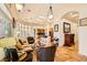 Spacious living room flows into the open-concept kitchen. Neutral colors and tile floors throughout at 4 Dry Brook Trl, Henderson, NV 89052