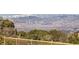 Breathtaking view of snow-capped mountains and city panorama from an elevated vantage point at 4 Dry Brook Trl, Henderson, NV 89052