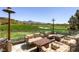 Comfortable outdoor seating area with golf course views, perfect for relaxation and social gatherings at 4 Dry Brook Trl, Henderson, NV 89052
