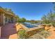 Well-maintained pool and spa featuring desert landscaping and a relaxing outdoor environment at 4 Dry Brook Trl, Henderson, NV 89052